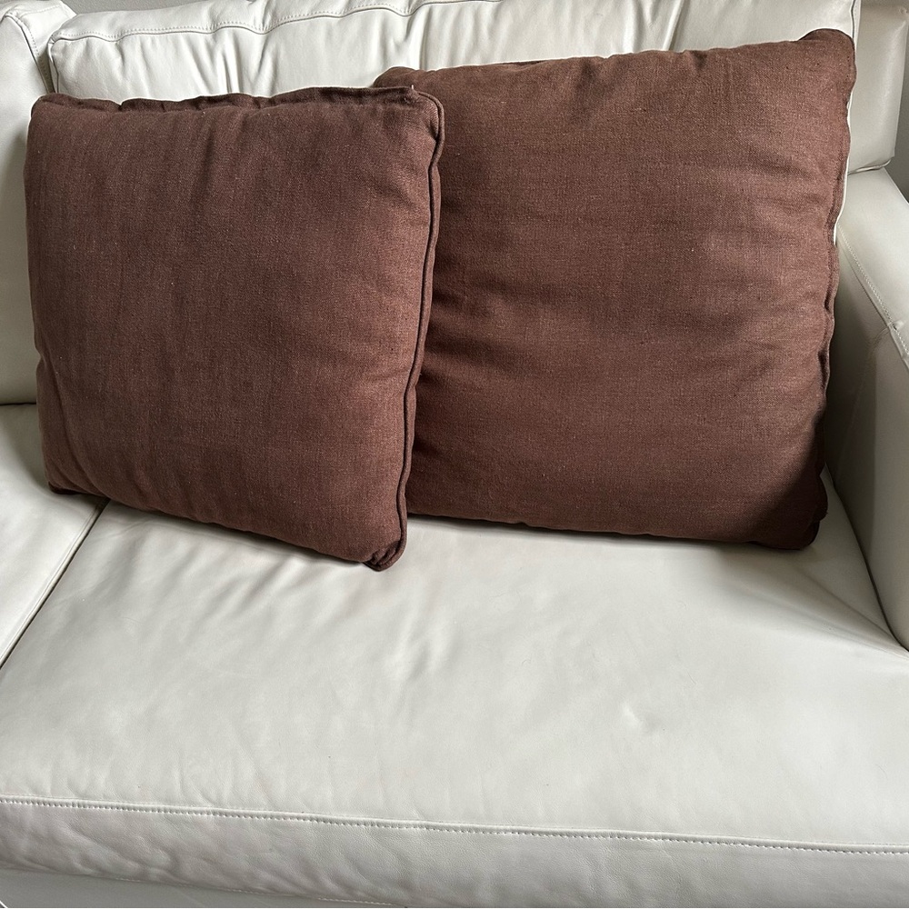 2 chocolate brown pillow covers. 20 inches by 20 inches.